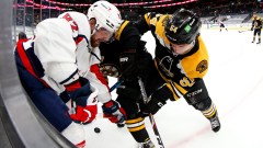 Boston Bruins defenseman Jack Ahcan, Washington Capitals forward Evgeny Kuznetsov