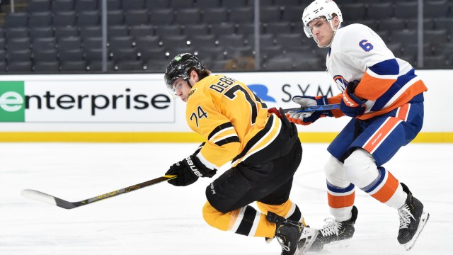 Boston Bruins winger Jake DeBrusk, New York Islanders defenseman Ryan Pulock