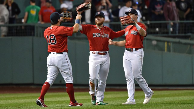 Boston Red Sox outfielders Kyle Schwarber, Alex Verdugo, Hunter Renfroe