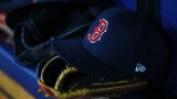 Detail view of Boston Red Sox hat and glove
