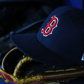 Detail view of Boston Red Sox hat and glove