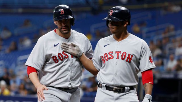 Boston Red Sox left fielder J.D. Martinez, third baseman Rafael Devers