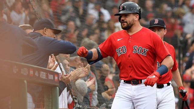 Boston Red Sox manager Alex Cora and first baseman Kyle Schwarber