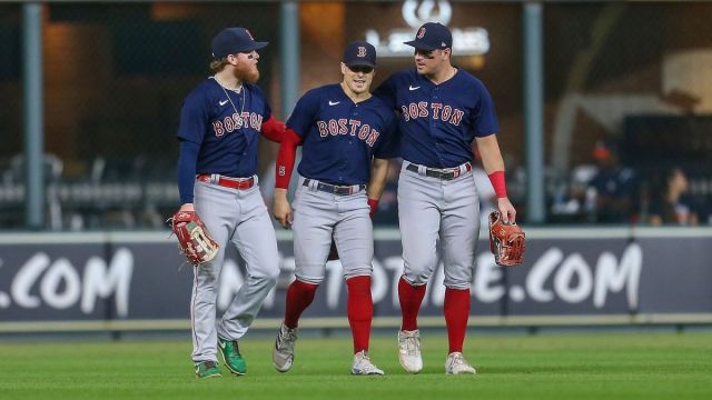 Boston Red Sox outfielders Alex Verdugo, Kiké Hernández, Hunter Renfroe