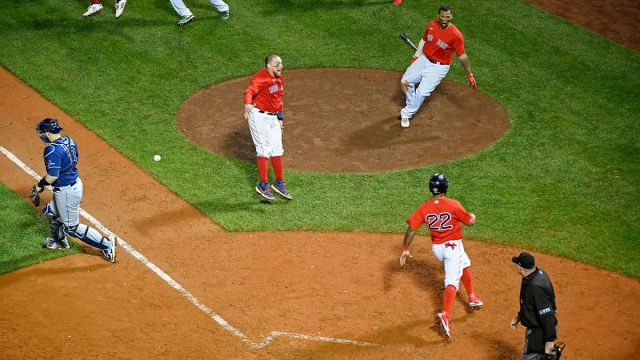 Boston Red Sox catcher Christian Vázquez and outfielder Danny Santana