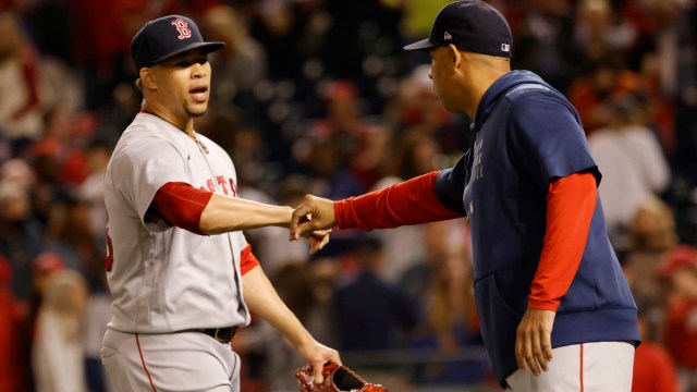 Boston Red Sox manager Alex Cora, relief pitcher Hansel Robles