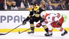 Boston Bruins defenseman Charlie McAvoy, Carolina Hurricanes' Jaccob Slavin
