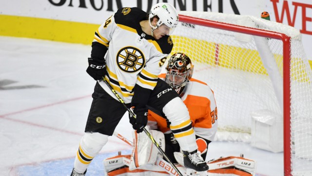 Boston Bruins winger Jakub Lauko, Philadelphia Flyers goalie Carter Hart