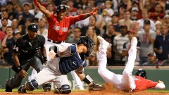 Boston Red Sox outfielder Kiké Hernández (5) and New York Yankees catcher Gary Sanchez