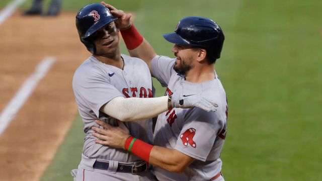 Boston Red Sox third baseman Rafael Devers and designated hitter Kyle Schwarber