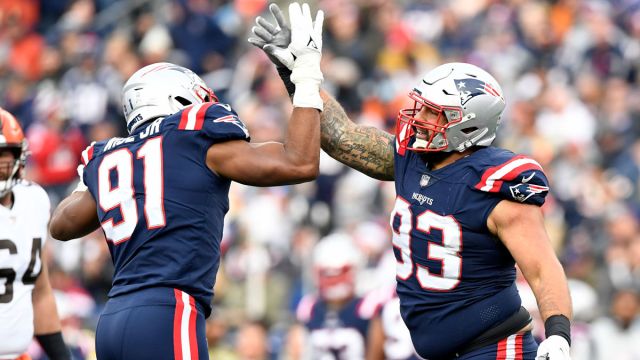 New England Patriots defensive linemen Deatrich Wise and Lawrence Guy