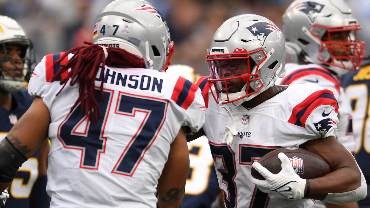 New England Patriots running back Jakob Johnson (47) runs off the