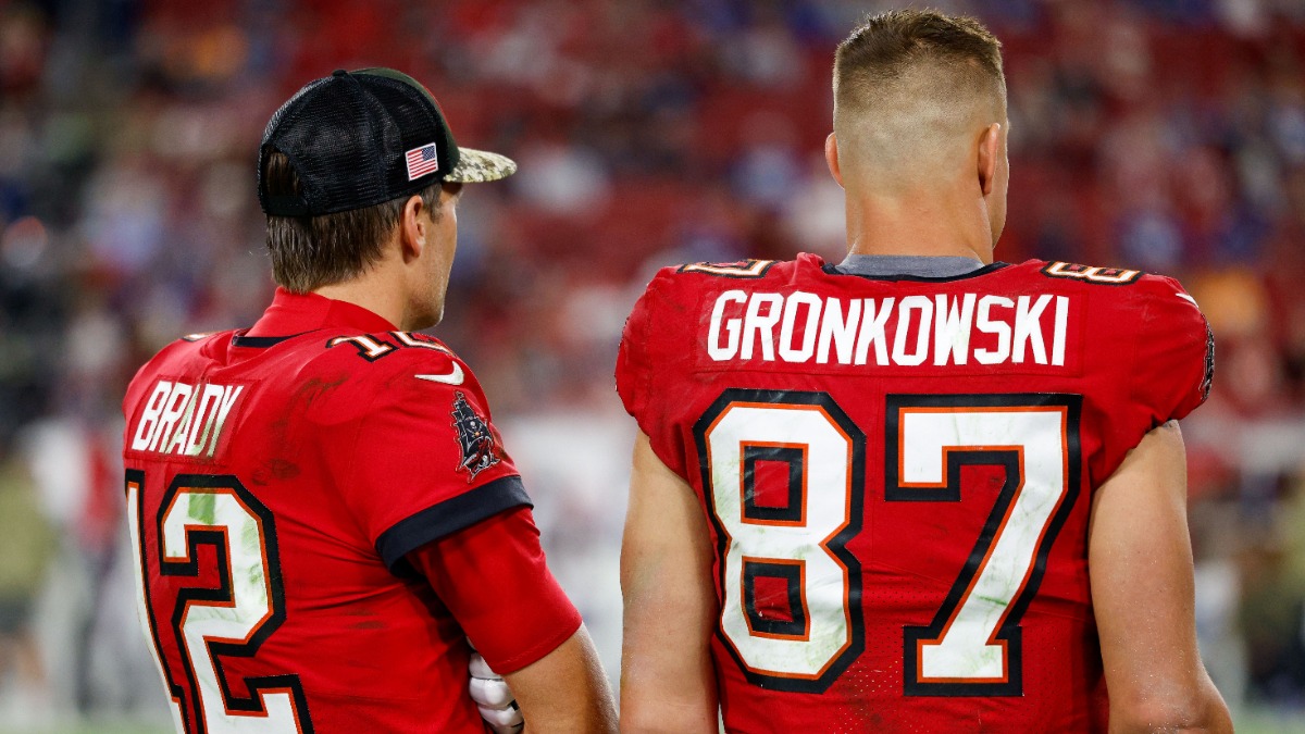 Tom Brady takes batting practice with Rob Gronkowski