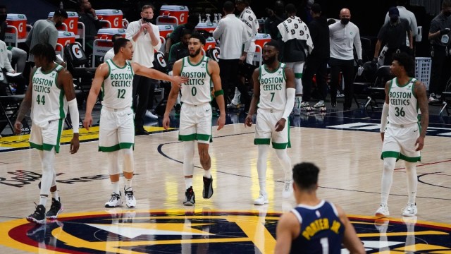 Boston Celtics center Robert Williams (44), forwards Grant Williams (12) and Jayson Tatum (0) and guards Jaylen Brown (7) and Marcus Smart (36)