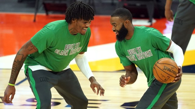 Boston Celtics center Robert Williams III (left) and guard Jaylen Brown