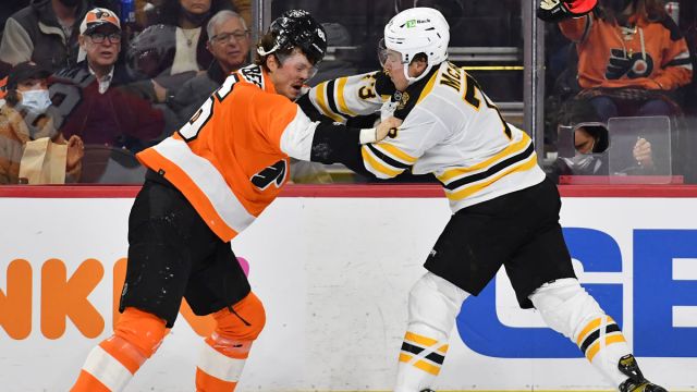 Boston Bruins defenseman Charlie McAvoy, Philadelphia Flyers left wing Joel Farabee