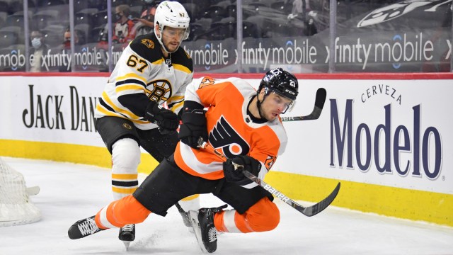 Boston Bruins defenseman Jakub Zboril, Philadelphia Flyers forward Scott Laughton