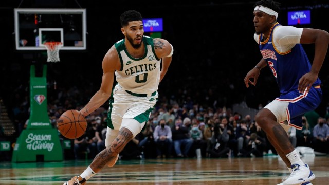 Boston Celtics forward Jayson Tatum (0) and Golden State Warriors center Kevon Looney