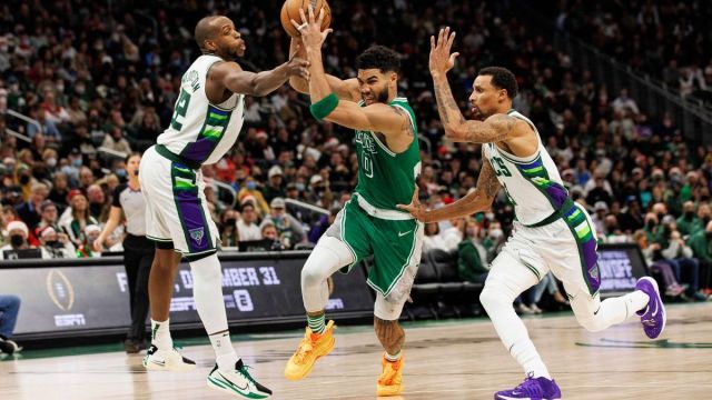 Boston Celtics wing Jayson Tatum, Milwaukee Bucks' Khris Middleton, George Hill