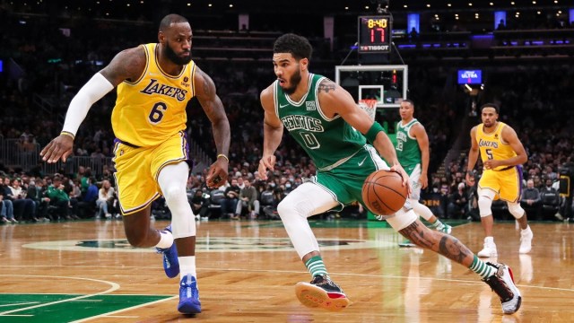 Boston Celtics forward Jayson Tatum (0) and Los Angeles Lakers forward LeBron James (6)