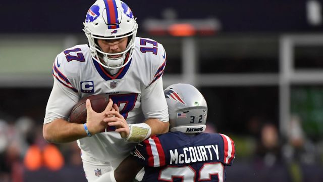 Buffalo Bills quarterback Josh Allen, New England Patriots free safety Devin McCourty