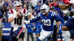 Indianapolis Colts defensive tackle DeForest Buckner, New England Patriots quarterback Mac Jones