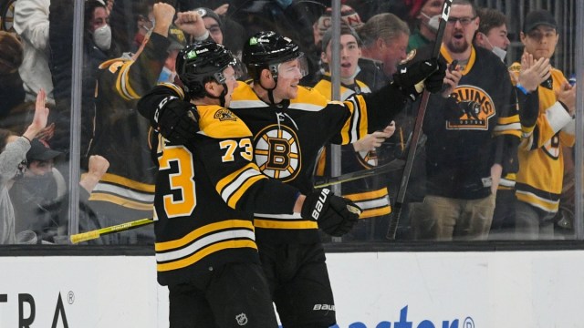 Boston Bruins forward Charlie Coyle and defenseman Charlie McAvoy