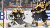 Boston Bruins goaltender Linus Ullmark (35) and defenseman Mike Reilly (6)