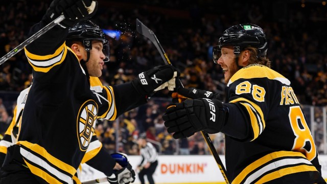 Boston Bruins forwards Taylor Hall and David Pastrnak