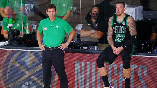Boston Celtics president of basketball operations Brad Stevens, guard Daniel Theis