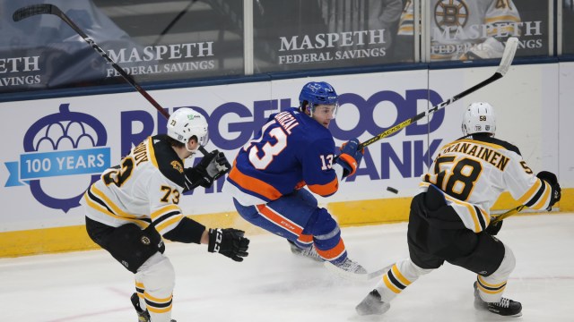 Boston Bruins defensemen Charlie McAvoy, Urho Vaakanainen