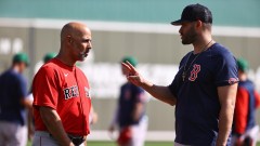 Boston Red Sox manager Alex Cora, designated hitter J.D. Martinez