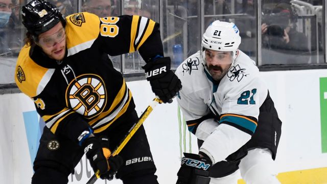 Boston Bruins forward David Pastnak, San Jose Sharks defenseman Jacob Middleton