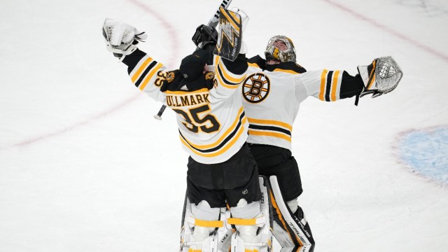 Boston Bruins goaltenders Jeremy Swayman (1) and Linus Ullmark (35)