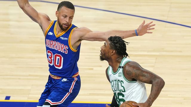 Boston Celtics guard Marcus Smart. Golden State Warriors guard Stephen Curry