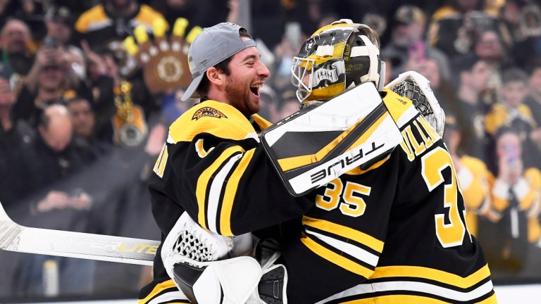 Boston Bruins goaltenders Jeremy Swayman (1) and Linus Ullmark (35)