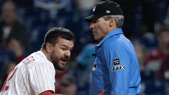 Philadelphia Phillies designated hitter Kyle Schwarber and Major League Baseball umpire Angel Hernandez