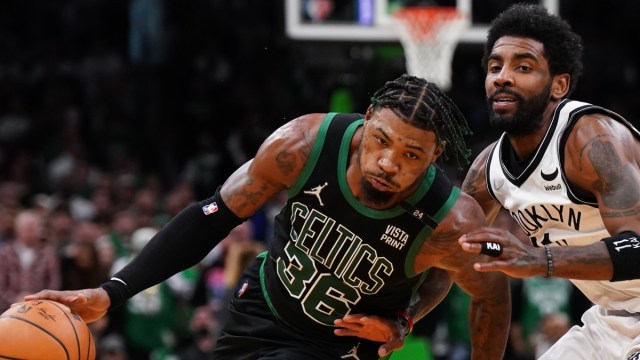 Boston Celtics guard Marcus Smart and Brooklyn Nets guard Kyrie Irving