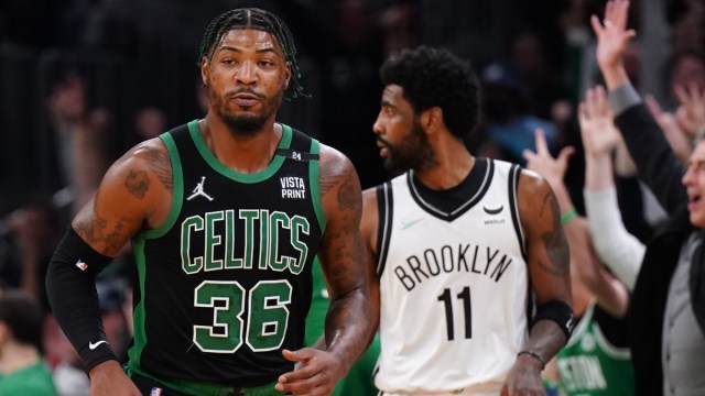 Boston Celtics guard Marcus Smart and Brooklyn Nets guard Kyrie Irving