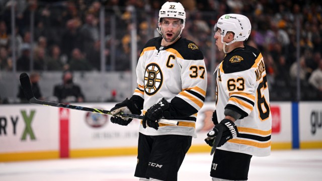 Boston Bruins forwards Patrice Bergeron and Brad Marchand