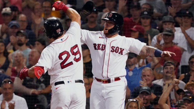 Boston Red Sox first baseman Bobby Dalbec (29) and catcher Christian Vázquez (7)