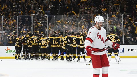The Boston Bruins celebrate their win over the Carolina Hurricanes