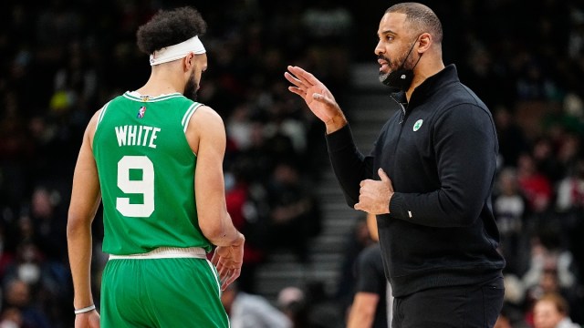 Boston Celtics head coach Ime Udoka talks and guard Derrick White (9)