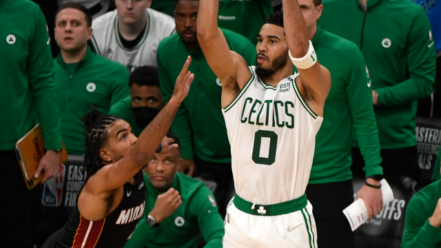 Miami Heat guard Gabe Vincent and Boston Celtics forward Jayson Tatum