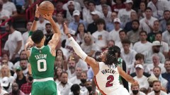 Boston Celtics forward Jayson Tatum and Miami Heat guard Gabe Vincent