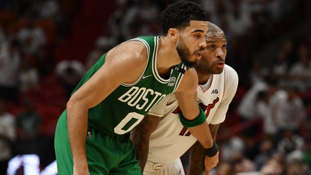 Boston Celtics forward Jayson Tatum and Miami Heat forward P.J. Tucker
