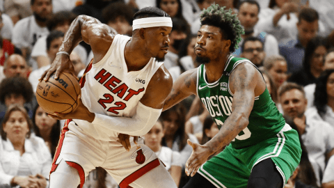 Miami Heat guard Jimmy Butler and Boston Celtics guard Marcus Smart