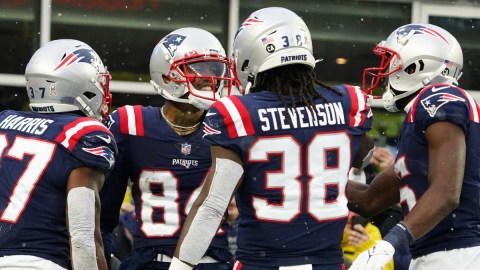 New England Patriots wide receiver Kendrick Bourne and running back Rhamondre Stevenson celebrate