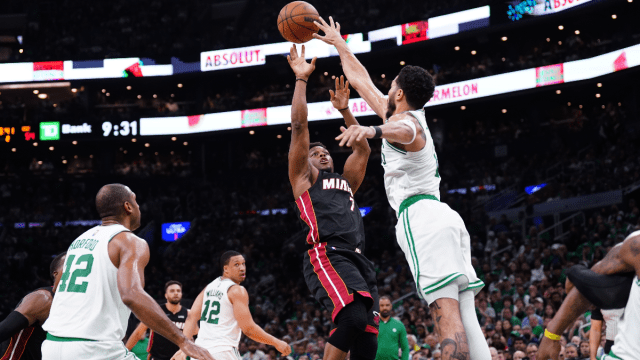 Miami Heat guard Kyle Lowry and Boston Celtics forward Jayson Tatum