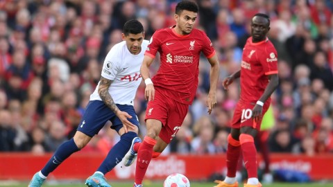 A Tottenham player chases Liverpool forward Luis Diaz (27)